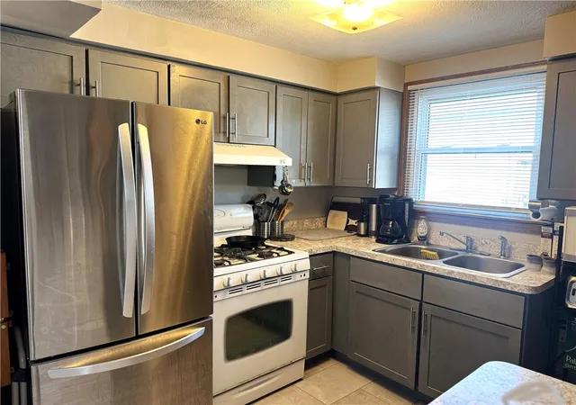 Photo 2 of Multi family home for sale at 89 Manomet St, Providence, RI 02909 | MLS# 1420947 | Listing updated on 2026-09-11
