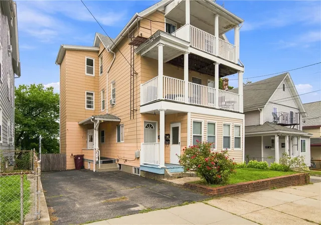 Photo 2 of Multi family home for sale at 444 Carrington Ave, Woonsocket, RI 02895 | MLS# 1420961 | Listing updated on 2026-10-28
