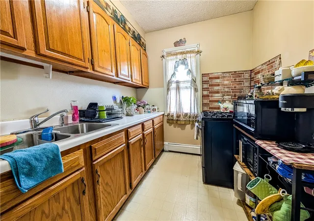 Photo 3 of Multi family home for sale at 37 6th Avenue, Woonsocket, RI 02895 | MLS# 1420995 | Listing updated on 2026-09-06