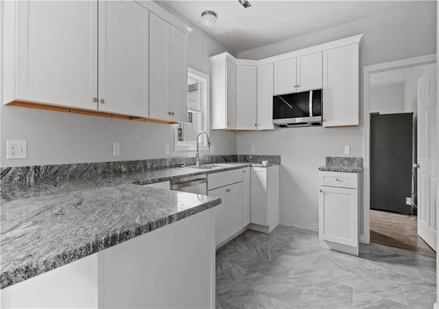 Photo 3 of Multi family home for sale at 31 Greenville Ave, Johnston, RI 02919 | MLS# 1419419 | Listing updated on 2026-09-11