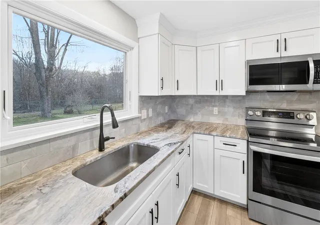 Photo 3 of Single family home for sale at 56 Sweet Fern Dr, Cranston, RI 02921 | MLS# 1421487 | Listing updated on 2026-09-06