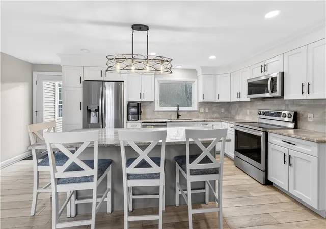 Photo 3 of Single family home for sale at 56 Sweet Fern Dr, Cranston, RI 02921 | MLS# 1421487 | Listing updated on 2026-09-06