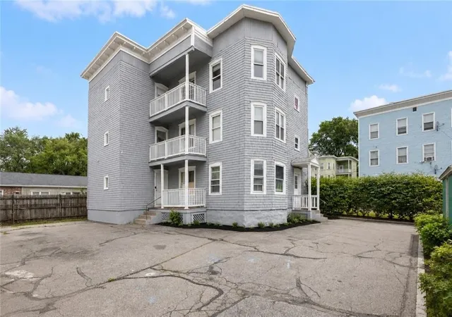 Photo 2 of Multi family home for sale at 409 Rathbun St, Woonsocket, RI 02895 | MLS# 1421531 | Listing updated on 2026-09-27