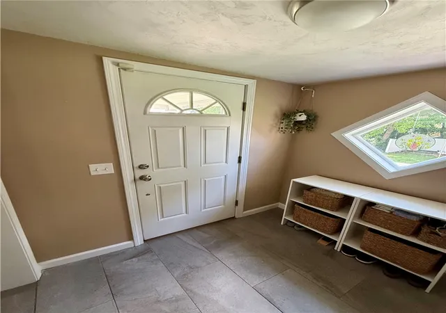 Photo 2 of Single family home for sale at 141 Cleveland St, Woonsocket, RI 02895 | MLS# 1421643 | Listing updated on 2026-09-28