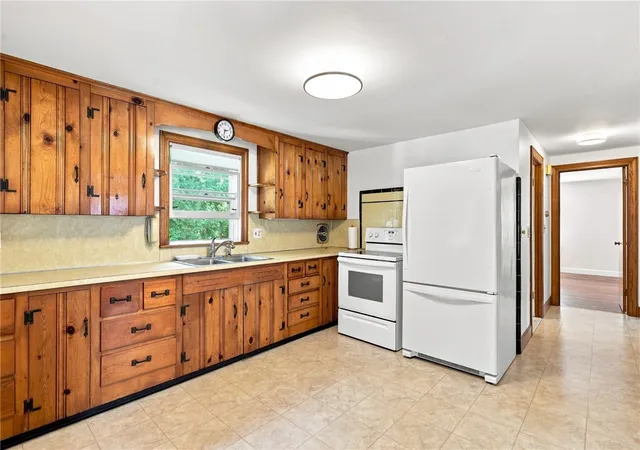 Photo 4 of Sale Pending at 12 Rollins Rd, Warwick, RI 02889 | MLS# 1421766 | Listing updated on 2026-09-07