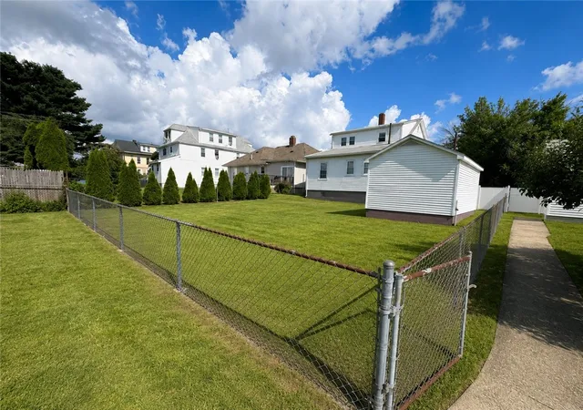 Photo 3 of Multi family home for sale at 293 Sutton Ave, East Providence, RI 02914 | MLS# 1421769 | Listing updated on 2026-09-12