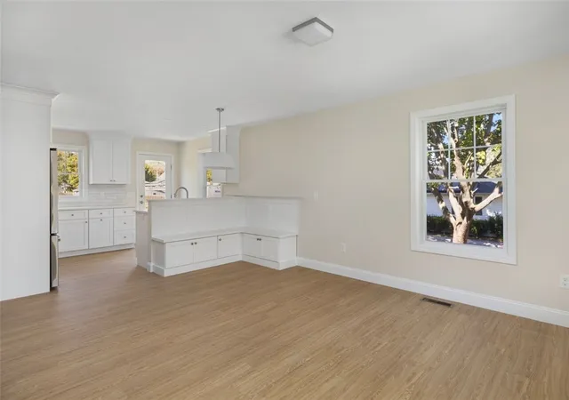 Photo 2 of Multi family home for sale at 19 Wood St, Warwick, RI 02889 | MLS# 1422258 | Listing updated on 2026-09-13