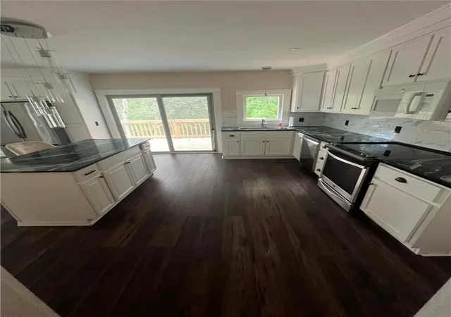 Photo 2 of Sale Pending at 389 Sayles Ave #1, Pascoag, RI 02859 | MLS# 1422106 | Listing updated on 2026-09-28