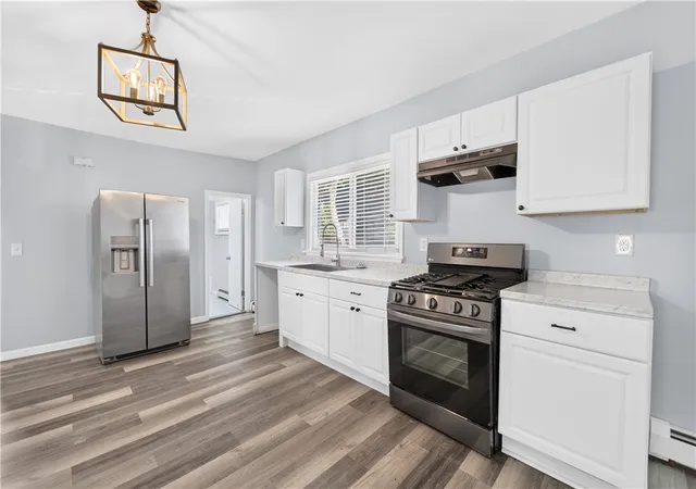Photo 2 of Multi family home for sale at 37 Ross St, Woonsocket, RI 02895 | MLS# 1422522 | Listing updated on 2026-10-04