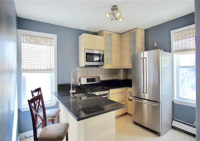 Photo 3 of Multi family home for sale at 143 Sutton St, Providence, RI 02903 | MLS# 1423141 | Listing updated on 2026-09-12