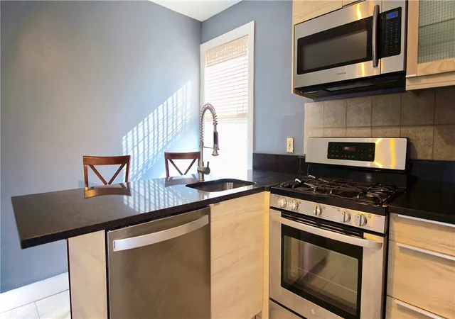 Photo 4 of Multi family home for sale at 143 Sutton St, Providence, RI 02903 | MLS# 1423141 | Listing updated on 2026-09-12