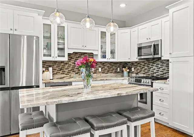Photo 1 of Sale Pending at 1 Desiree Ct #F, Smithfield, RI 02917 | MLS# 1424272 | Listing updated on 2026-10-12