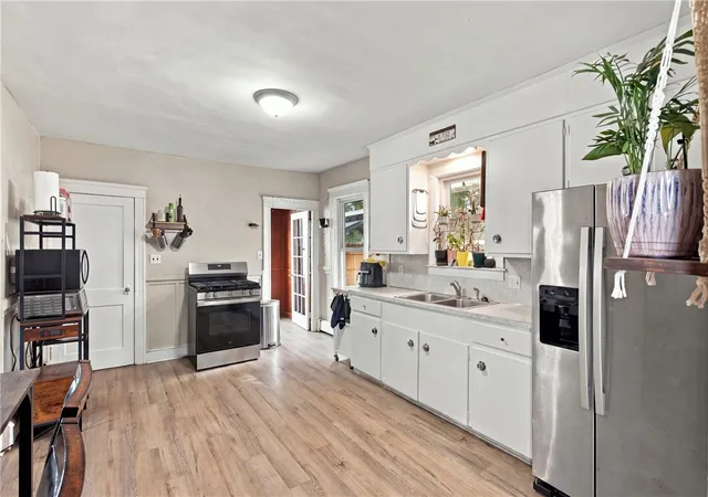 Photo 3 of Single family home for sale at 297 Burnside Ave, Woonsocket, RI 02895 | MLS# 1424405 | Listing updated on 2026-10-20