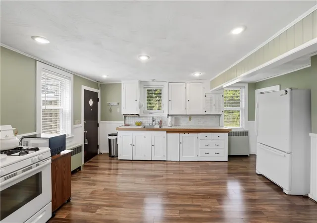 Photo 3 of Single family home for sale at 512 Woonasquatucket Ave, North Providence, RI 02911 | MLS# 1425517 | Listing updated on 2026-10-21