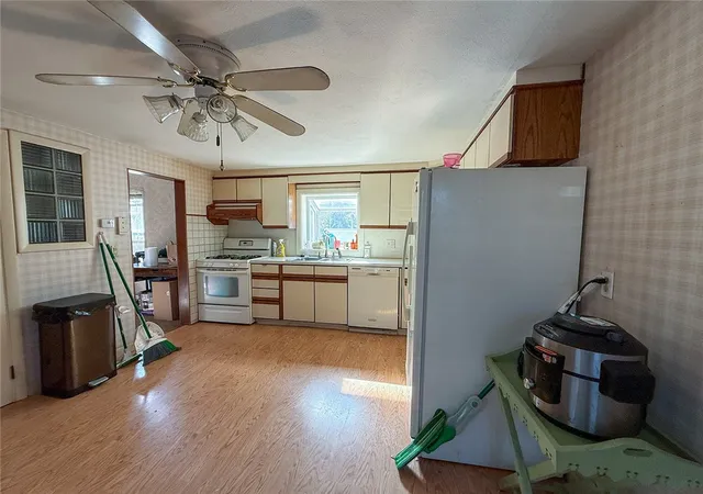 Photo 2 of Multi family home for sale at 333 Cass Ave, Woonsocket, RI 02895 | MLS# 1425823 | Listing updated on 2026-10-18