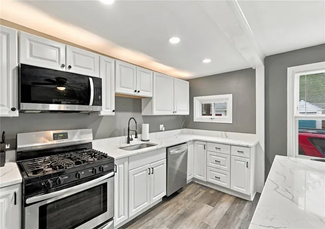 Photo 2 of Single family home for sale at 27 Cooper St, East Providence, RI 02914 | MLS# 1426061 | Listing updated on 2026-10-22