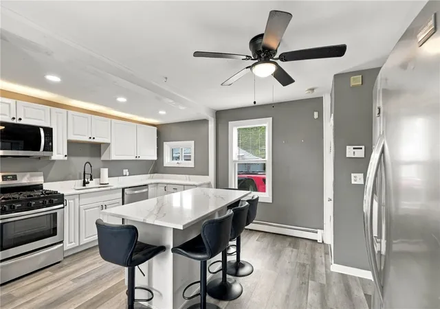 Photo 2 of Single family home for sale at 27 Cooper St, East Providence, RI 02914 | MLS# 1426061 | Listing updated on 2026-10-22