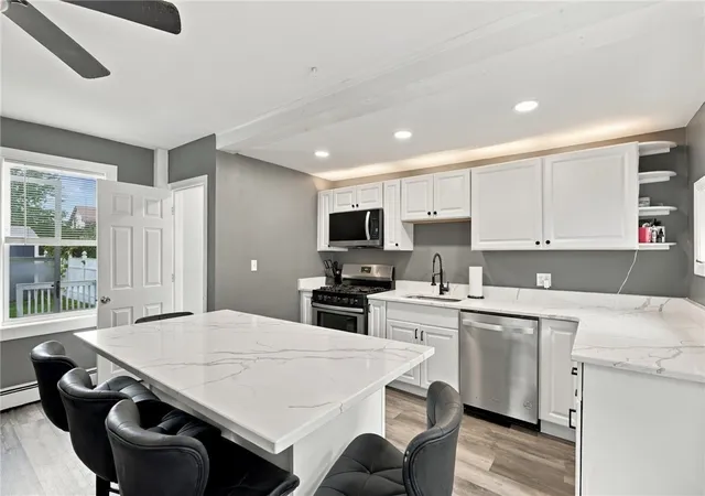 Photo 4 of Single family home for sale at 27 Cooper St, East Providence, RI 02914 | MLS# 1426061 | Listing updated on 2026-10-22