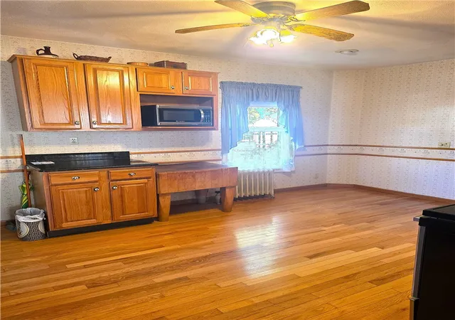 Photo 3 of Single family home for sale at 26 Collins St, Woonsocket, RI 02895 | MLS# 1425868 | Listing updated on 2026-10-20