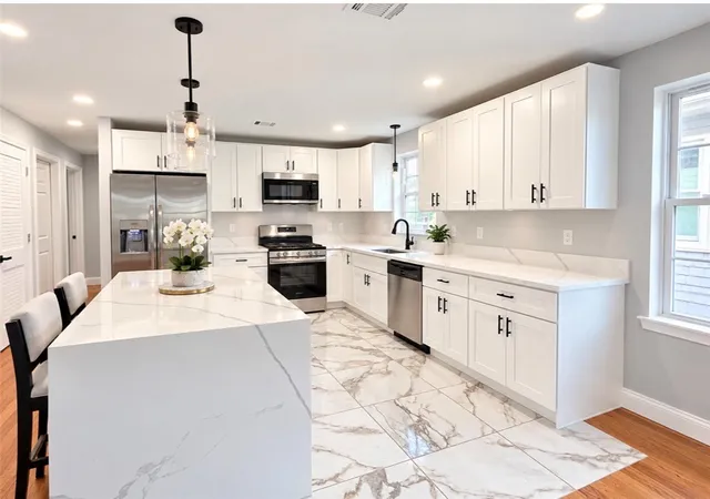 Photo 3 of Multi family home for sale at 72 Roanoke St, Providence, RI 02908 | MLS# 1426179 | Listing updated on 2026-10-28