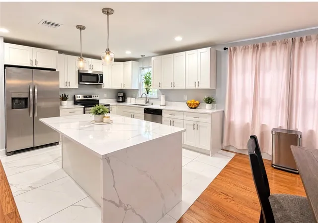 Photo 4 of Multi family home for sale at 72 Roanoke St, Providence, RI 02908 | MLS# 1426179 | Listing updated on 2026-10-28