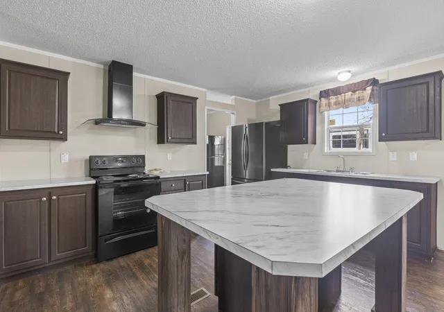 Photo 4 of Manufactured home for sale at 1112 Carolina Cvs, North Myrtle Beach, SC 29582 | MLS# 2602325 | Listing updated on 2026-09-09