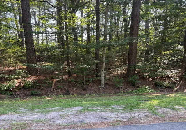 Photo 2 of Sale Pending at 13 Myrtlewood Dr, Carolina Shores, NC 28467 | MLS# 2620313 | Listing updated on 2026-09-10