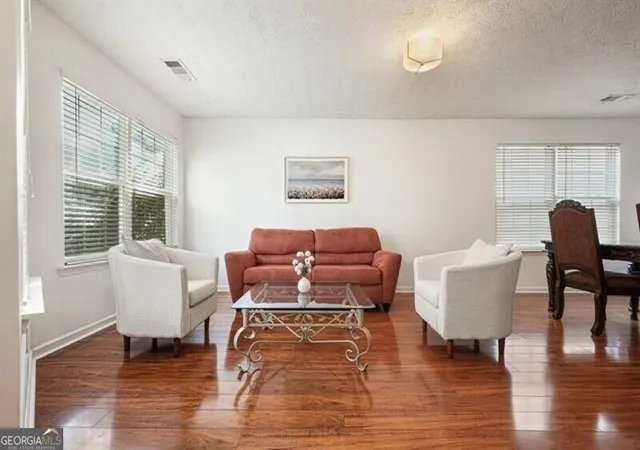 Photo 2 of Single family home for sale at 115 Village Tr, Woodstock, GA 30188 | MLS# 10843062 | Listing updated on 2026-09-10