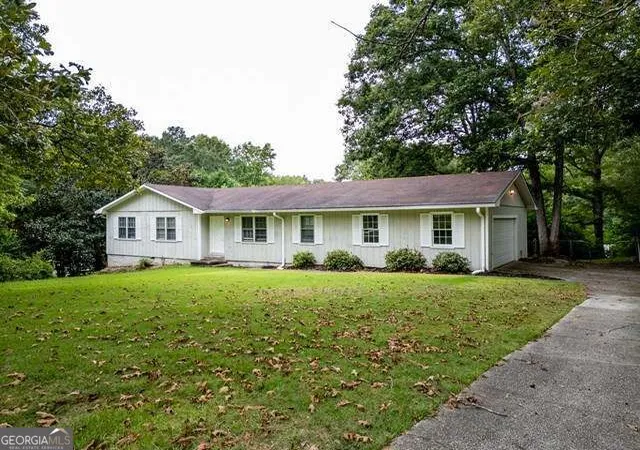 Photo 1 of Townhouse for sale at 2460 Rolling Acres Dr Sw, Conyers, GA 30094 | MLS# 10853418 | Listing updated on 2026-09-25