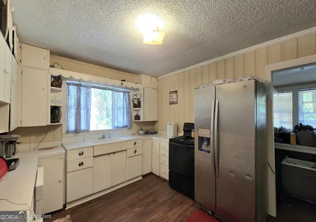Photo 3 of Single family home for sale at 397 Dock Hyde Rd, Carrollton, GA 30116 | MLS# 10851039 | Listing updated on 2026-10-06