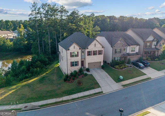 Photo 2 of Single family home for sale at 327 Round Pond Dr, Lilburn, GA 30047 | MLS# 10843869 | Listing updated on 2026-09-11