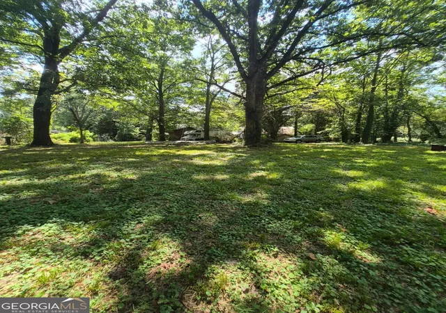 Photo 2 of Single family home for sale at 5884 Rockbridge Rd, Stone Mountain, GA 30087 | MLS# 10837778 | Listing updated on 2026-09-15