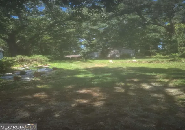 Photo 3 of Single family home for sale at 5884 Rockbridge Rd, Stone Mountain, GA 30087 | MLS# 10837778 | Listing updated on 2026-09-15