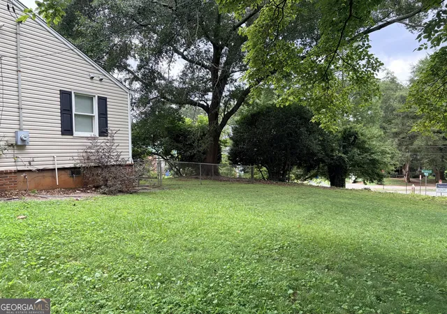 Photo 2 of Single family home for sale at 1470 Woodbine Ave Se, Atlanta, GA 30317 | MLS# 10800802 | Listing updated on 2026-09-11