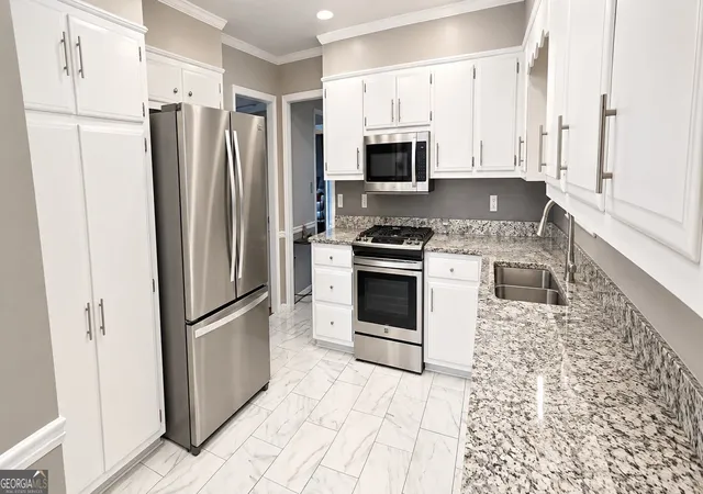 Photo 2 of Single family home for sale at 6586 Deshon Cir, Lithonia, GA 30058 | MLS# 10841588 | Listing updated on 2026-09-24