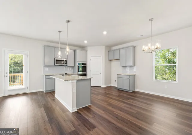 Photo 3 of Single family home for sale at 1861 Millstone Manor, Conyers, GA 30013 | MLS# 10851965 | Listing updated on 2026-09-28