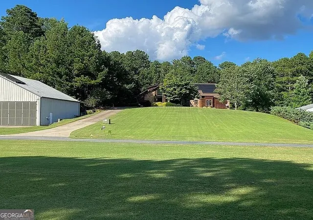 Photo 3 of Mansion for sale at 2320 Kitfox Cir, Cumming, GA 30041 | MLS# 10842543 | Listing updated on 2026-09-14