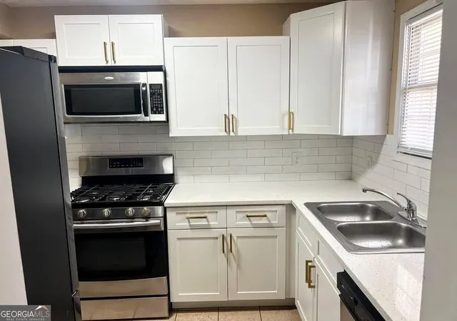 Photo 2 of Townhouse for sale at 2378 Cove Rd, Lithonia, GA 30058 | MLS# 10845896 | Listing updated on 2026-09-23