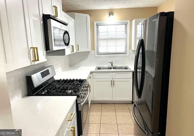 Photo 3 of Townhouse for sale at 2378 Cove Rd, Lithonia, GA 30058 | MLS# 10845896 | Listing updated on 2026-09-23