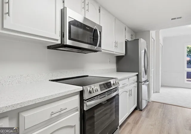 Photo 4 of Townhouse for sale at 3229 Clairmont N Rd NE, Atlanta, GA 30329 | MLS# 10841525 | Listing updated on 2026-09-22
