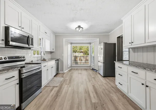 Photo 3 of Single family home for sale at 313 Glen Iris Dr, Monroe, GA 30655 | MLS# 10845963 | Listing updated on 2026-10-09