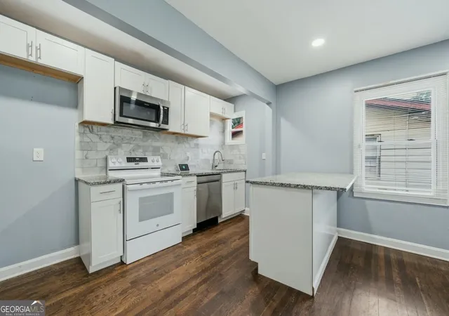 Photo 3 of Single family home for sale at 1001 Moreland Dr, Atlanta, GA 30067 | MLS# 10852854 | Listing updated on 2026-09-25