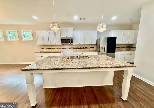 Photo 2 of Single family home for sale at 5190 Amberland Sq, Atlanta, GA 30349 | MLS# 10848297 | Listing updated on 2026-10-25