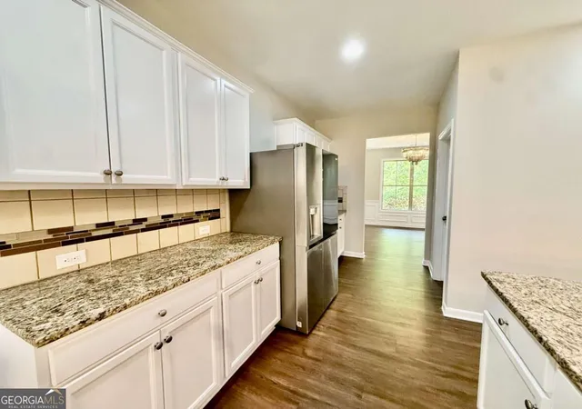 Photo 4 of Single family home for sale at 5190 Amberland Sq, Atlanta, GA 30349 | MLS# 10848297 | Listing updated on 2026-10-25