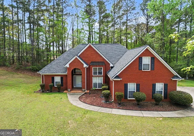 Photo 1 of Single family home for sale at 1041 Olive Dr, Hampton, GA 30228 | MLS# 10851829 | Listing updated on 2026-10-07