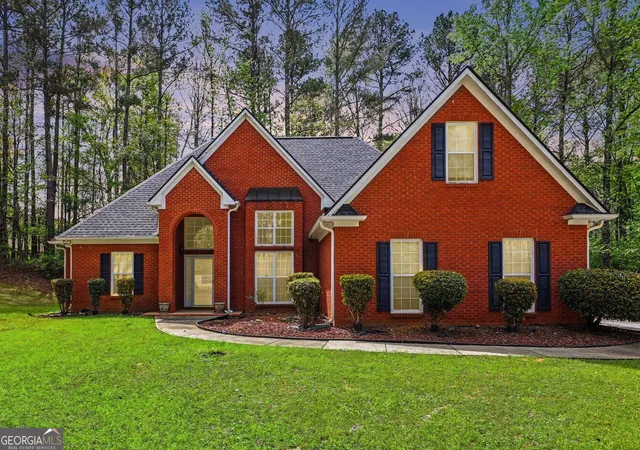 Photo 2 of Single family home for sale at 1041 Olive Dr, Hampton, GA 30228 | MLS# 10851829 | Listing updated on 2026-10-07