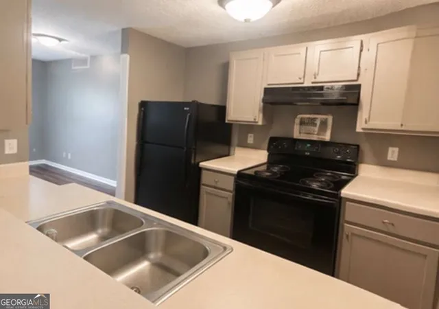 Photo 3 of Condo for sale at 7202 Par Four Way, Lithonia, GA 30038 | MLS# 10837928 | Listing updated on 2026-09-15
