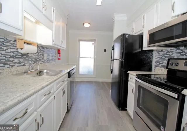 Photo 3 of Condo for sale at 2340 Beaver Ruin Rd #UN7, Norcross, GA 30071 | MLS# 10846203 | Listing updated on 2026-09-30