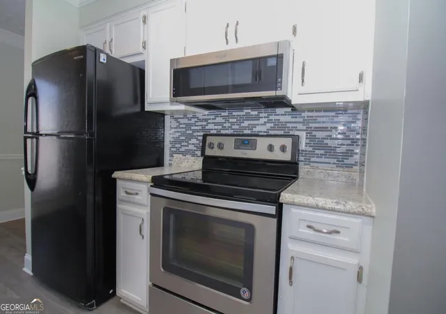 Photo 4 of Condo for sale at 2340 Beaver Ruin Rd #UN7, Norcross, GA 30071 | MLS# 10846203 | Listing updated on 2026-09-30