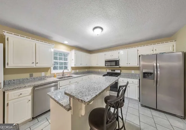 Photo 3 of Single family home for sale at 315 Magnolia Dr, Canton, GA 30114 | MLS# 10852110 | Listing updated on 2026-09-24